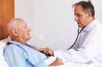 Doctor Checking the Heart of an Elderly Man