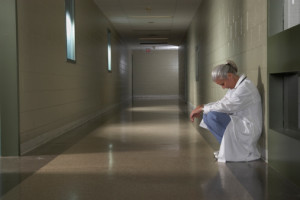 doctor sitting in hallway