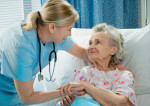 doctor with elderly female patient